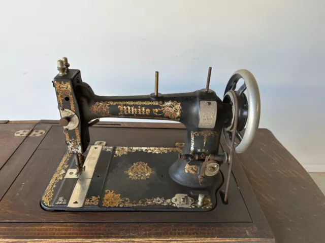 vintage antique White treadle sewing machine with timber and cast iron base