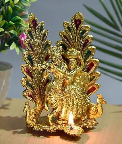 INDIAN TRADITIONAL METAL Radha Krishna Idol With Diya Peacock Design ...