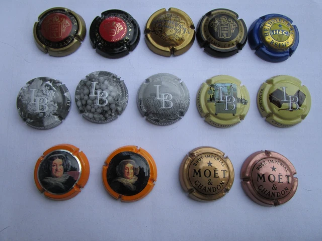 Capsules champagne - lot  Heidsick -Luc Betouzet -vve Cliquot -Moët