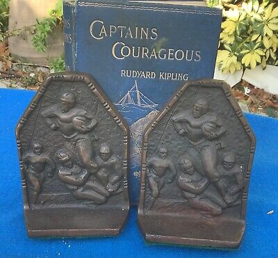 vintage bronze-plated football bookends, leather helmets, circa 1920s