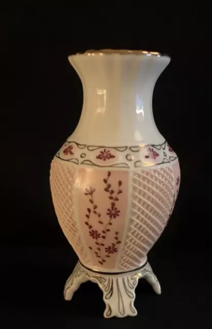 Vase porcelaine, rose et doré, signé et numéroté