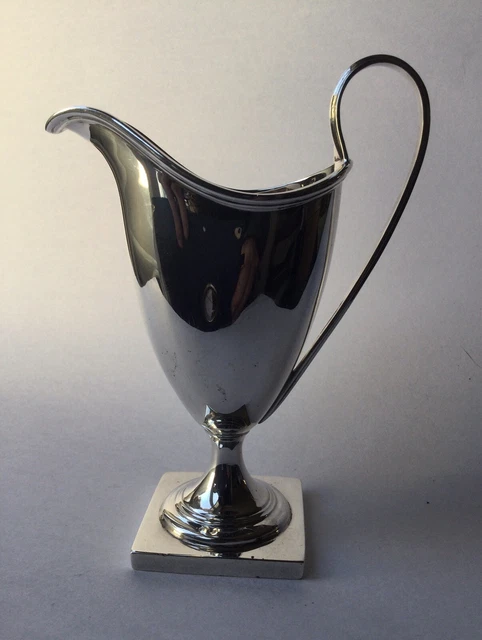 Solid Silver helmet shaped Cream jug Thomas Bradbury Hallmarked Sheffield 1934.