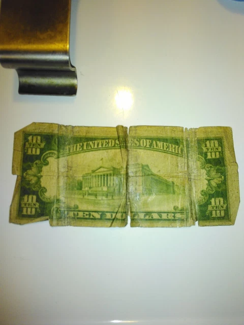 1934A SILVER CERTIFICATE BLUE SEAL TEN DOLLAR STAR NOTE. A little ware and tear. 2