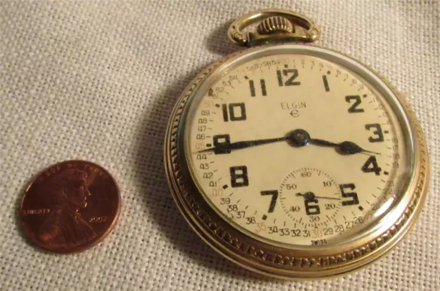 Elgin Pocketwatch gold plated around 2 inches diameter