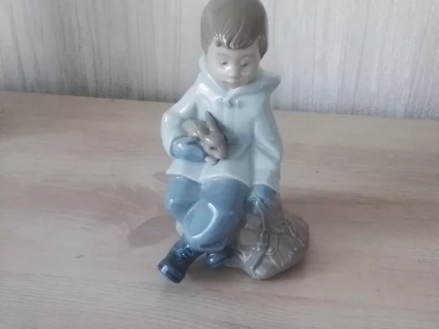 Nao By Lladro, Figurine Of Young Boy With Rabbit & Satchel.excellent Condition