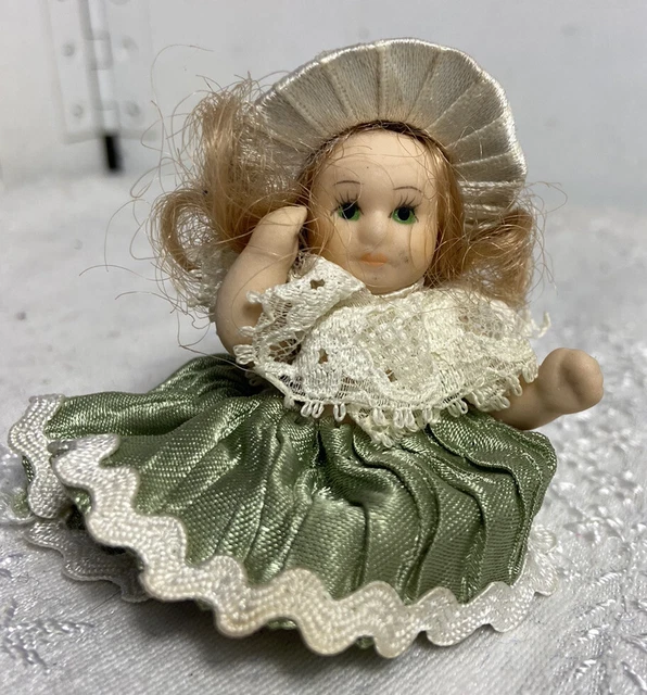 Vintage Bisque Porcelain Doll 3" Jointed Dollhouse miniature Satin Green w hat