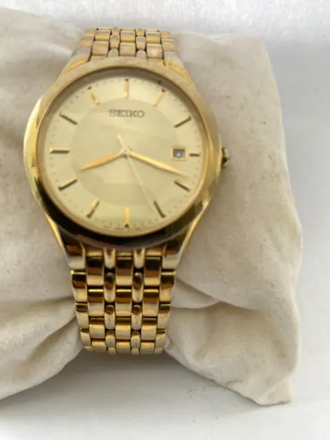 SEIKO HERREN SAPHIR Vintage schmal Datum Quarz vergoldete Armbanduhr  7N320AZO EUR 109,61 - PicClick DE