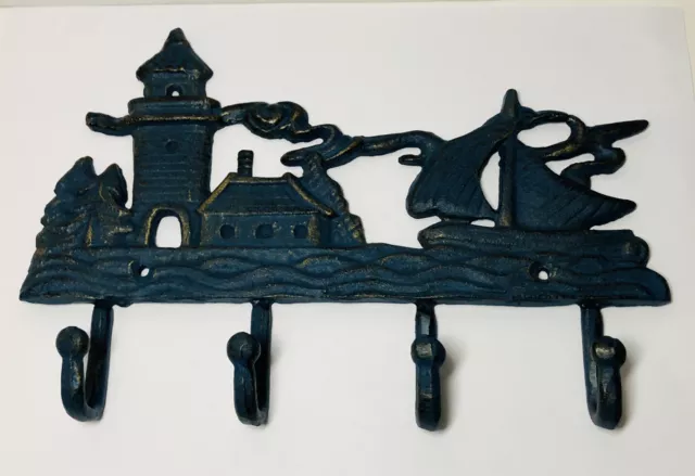 Vintage cast iron coat rack four hooks