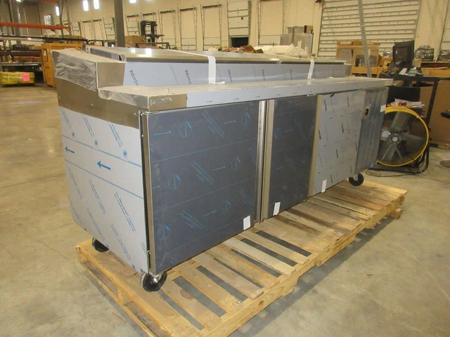 Delfield 91" 3 Solid Door Refrigerated Pizza Prep Table 22.82 Cu. Ft. Capacity