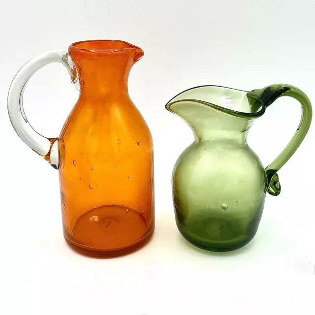 LOT 2 MCM JAMESTOWN GLASS PITCHERS Avocado Green Orange Applied Handles Bubbly