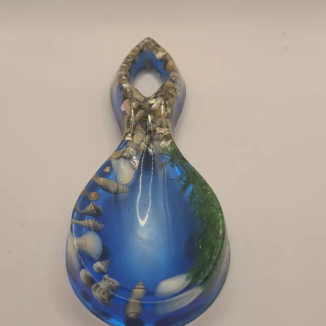 Lucite vintage spoon rest in ocean blue with shells all over. MCM. Vintage
