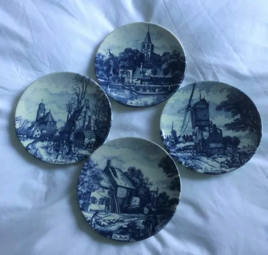 Set of 4 blue dutch Delft plates depicting the seasons.  Jan v/d Velde - used