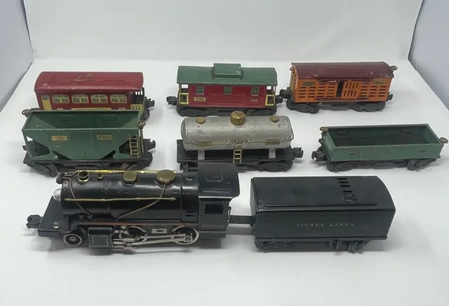 Random Lot of Lionel Line Train Cars and Steam Engine with Tracks