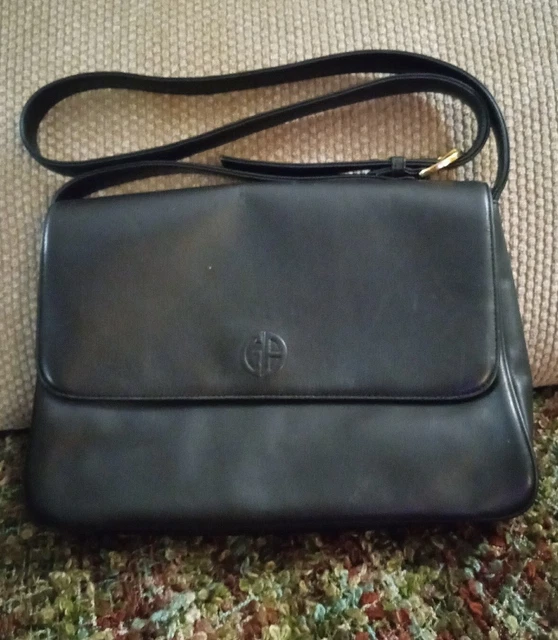Giani Bernini Black Handbag 3 inside compartments 1 compartment on the back.