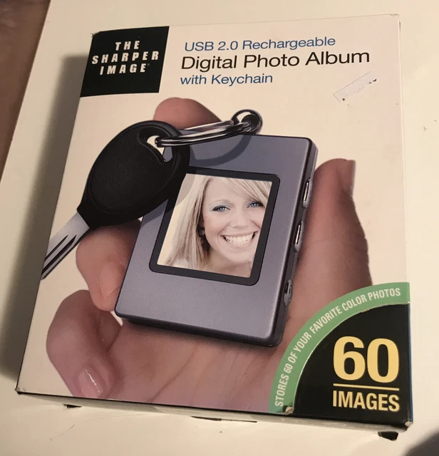 The Sharper Image USB2.0 Rechargeable Digital60 Photo Album w/KeyChain C Descrip