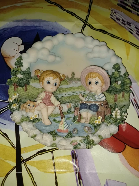 Montefiori Collection Girl & Boy In Pond Fishing Round 8 Inch Wall Hang Figurine