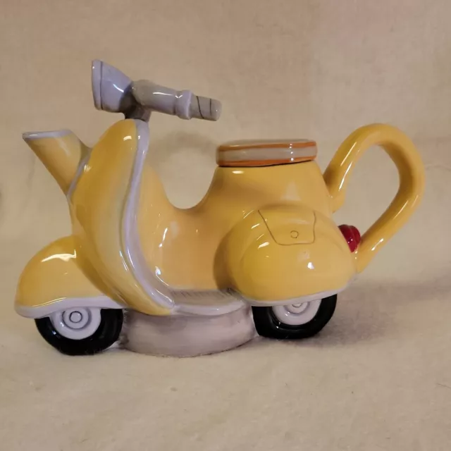 Blue Sky Clayworks Yellow and Blue  Motorcycle Teapot 2014. A Nice Piece.