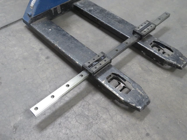 Lot of 2 THK SNS55 Linear Bearing Blocks on a 59 in Rail T191011