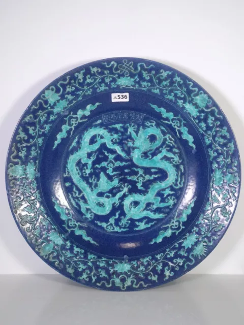 A Large Blue Glazed 'Two Dragons' Charger