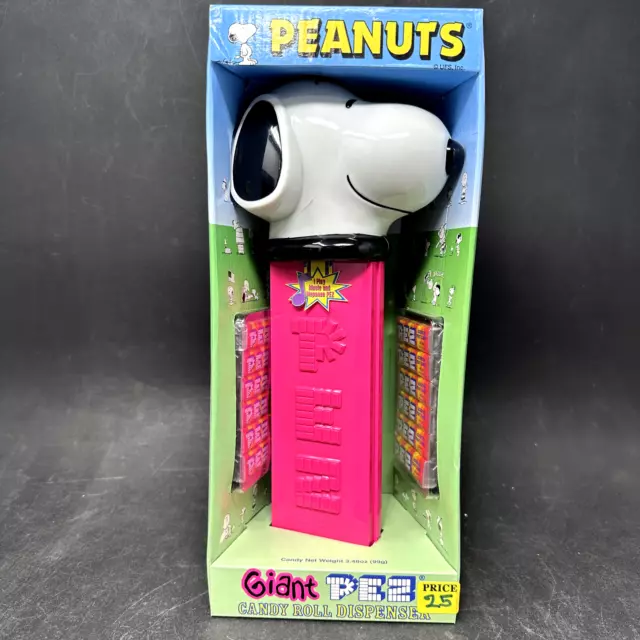 https://www.picclickimg.com/7DkAAOSwcUxlf1o5/Peanuts-Snoopy-Giant-PEZ-Candy-Roll-Dispenser-Brand.webp