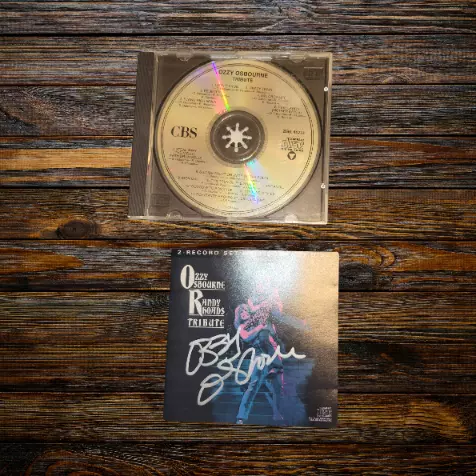 Ozzy Osbourne Signed cd***Tribute***