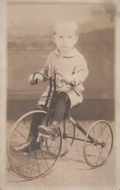 RPPC Postcard Little Boy Riding Tricycle c. 1900s