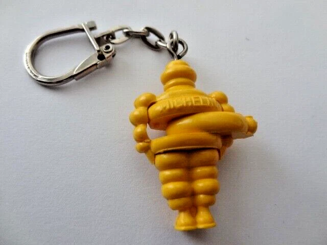 Vintage keychain Michelin Bibendum dexterity puzzle  tyre man yellow.