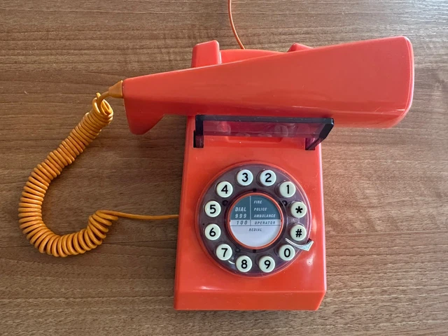 orange-trim-phone-retro-style-plug-in-landline-push-button-on-circle