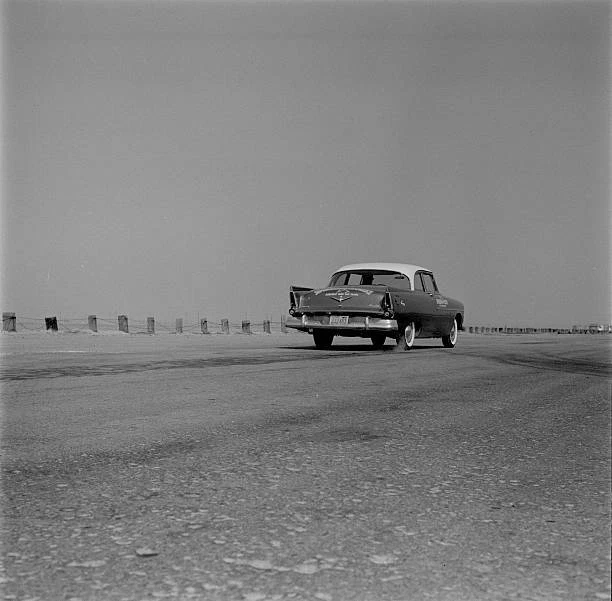1956 Plymouth Savoy With Mcculloch Motors Supercharger Old Road Test Photo
