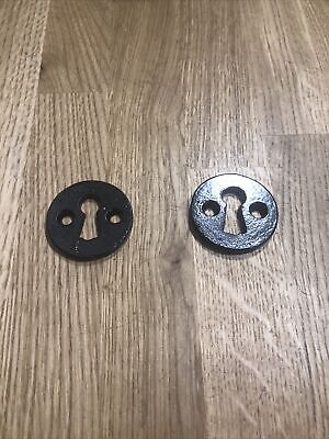 2 black Round period black iron escutcheon keyholes
