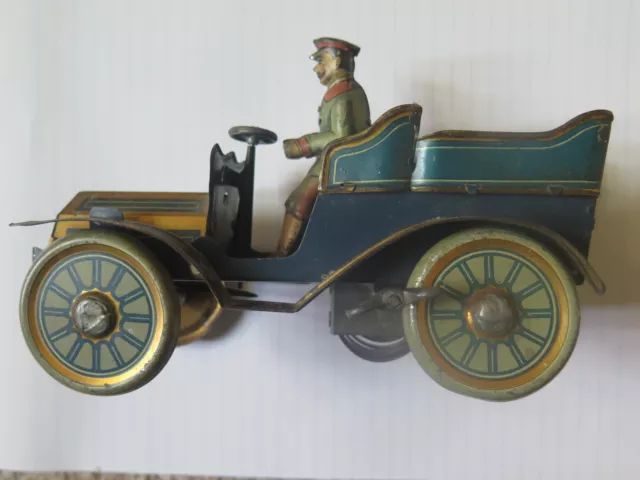 GERMAN CLOCKWORK TIN TOY in EXCELLENT CONDITION CAR & DRIVER c1920s COMPLETE