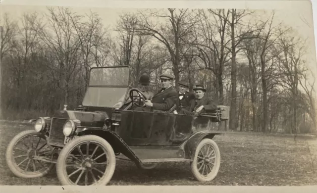 RPPC Postcard Men Posing In Old Car Portrait Real Photo Postcard Vintage