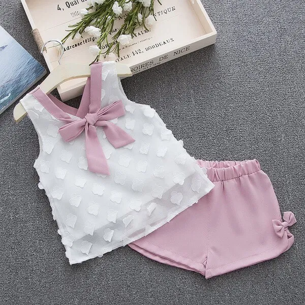 Completo Bimba bambina Maglia maniche corte pantaloni corti bianco rosa  B043