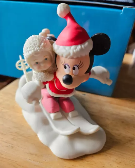 https://www.picclickimg.com/7QEAAOSwLIFlNpl9/Snowbabies-Walt-Disney-Showcase-Minnies-Special-Deliveries-Figurine.webp