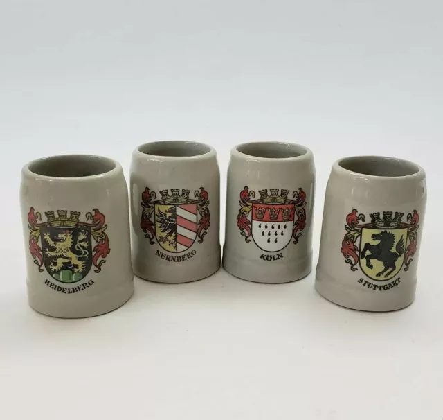 VTG W Germany Town Crest Glazed Stoneware Beer steins mini shots Mug set of 4