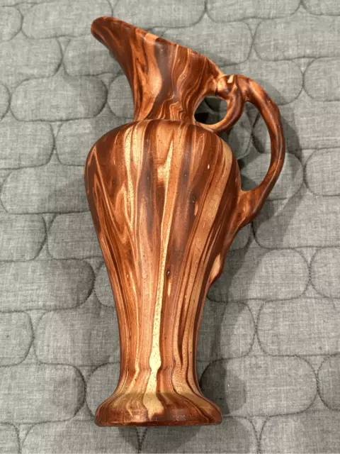 Unique handmade ceramic pitcher.