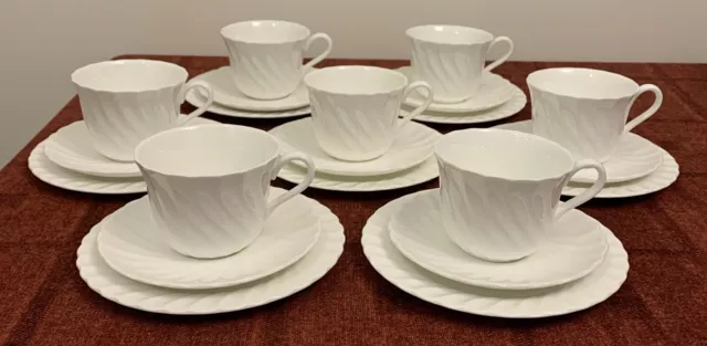 7 Wedgwood White Swirl Bone China Trios, Cups, Saucers & Side Plates