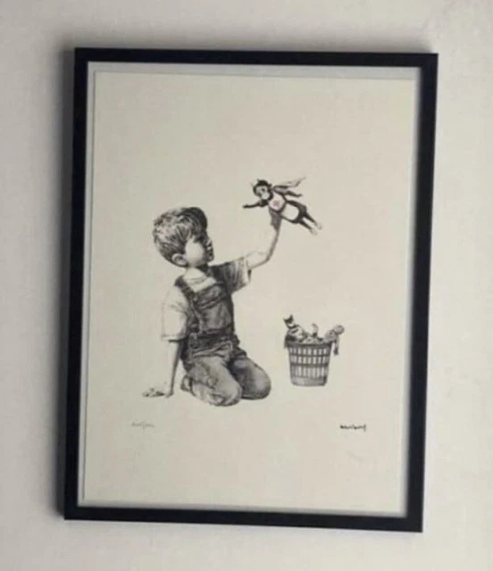 lithographie banksy avec certificat et encadrée