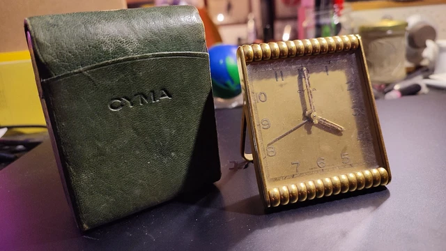 Sveglia da viaggio CYMA 1950s ottone dorato vintage reveil alarm clock swiss