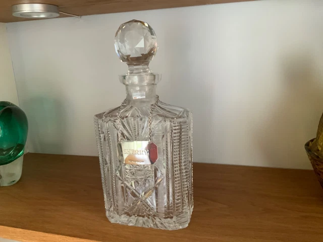 BEAUTIFULLY CUT LEAD CRYSTAL DECANTER with STERLING SILVER SHERRY LABEL