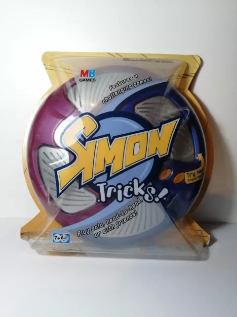 Hasbro Simon Electronic Memory Game Simon Says Simon Tricks/ Trickster packaged