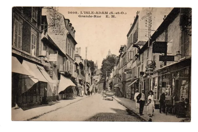 Cpa 95 L’Isle-Adam. Grande Rue. Animée. Dos divisé, non écrit. Bon état visible