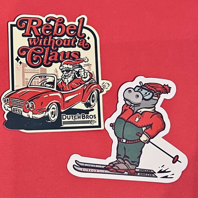 LOT OF TWO (2) December 2023 Dutch Bros Skiing Hippo & Rebel Santa