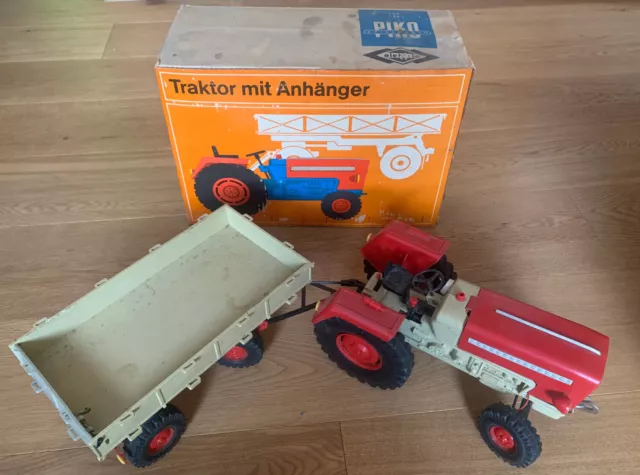 DDR Spielzeug Traktor in Rot mit Anhänger von Anker Piko