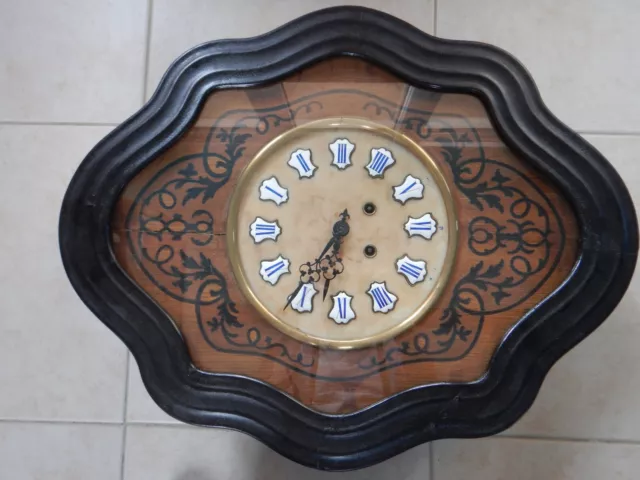 horloge "Oeil de boeuf"