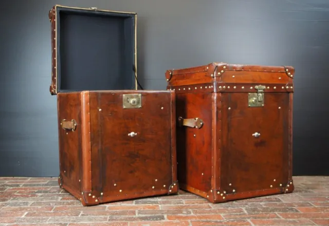 Handmade matching pair of antique leather finished occasional side table trunks