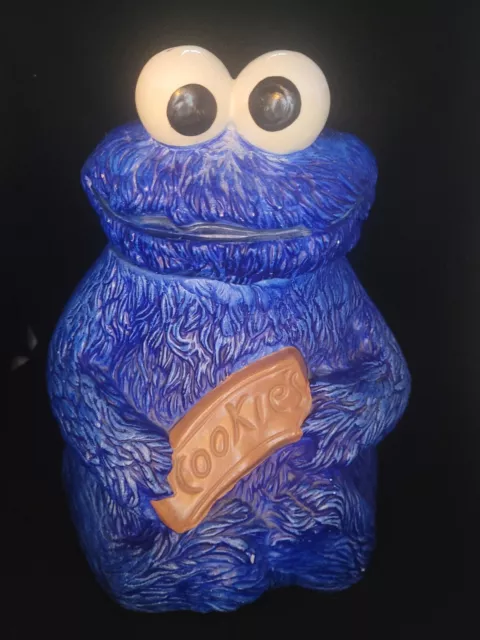 https://www.picclickimg.com/7lIAAOSwc0lj0qxK/Vintage-Cookie-Monster-Cookie-Jar-Ceramic-970-Sesame.webp
