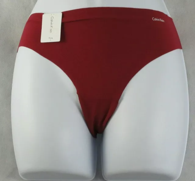 Calvin Klein Women's Invisibles Thong Panty Underwear, Dark Red, XS