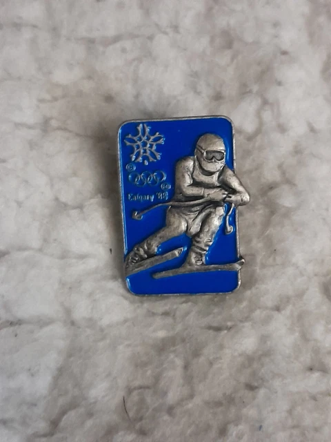 Pin's SPORT / JEUX OLYMPIQUES / JO - Patinage patins à glace STOC