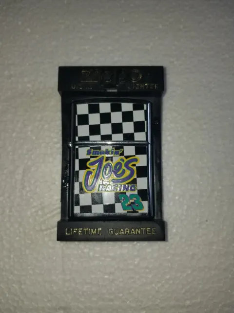 Vintage 1997 Smokin' Joe's Racing #23 Checkered Flag Zippo Lighter that is brand